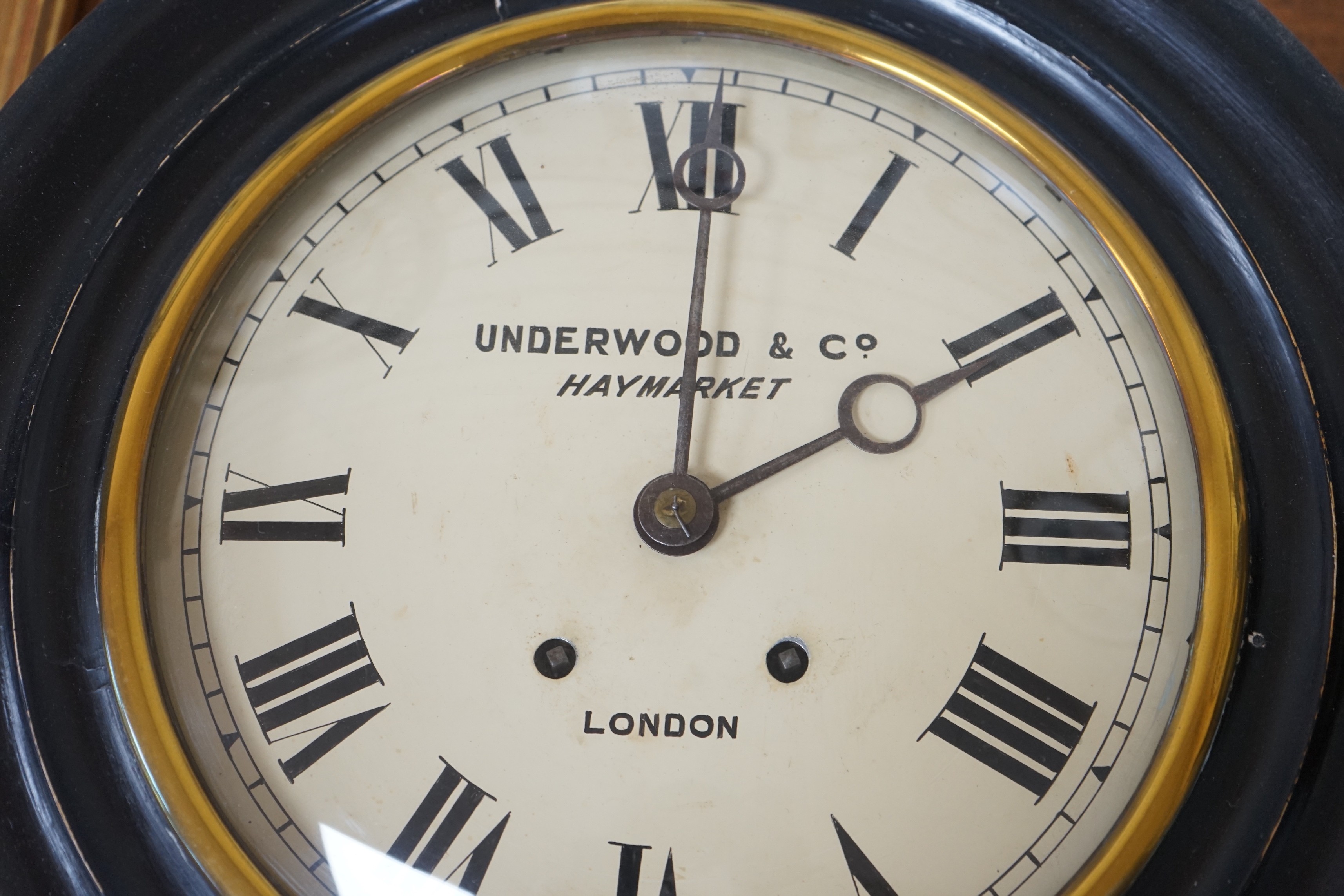 An Underwood & Company, Haymarket wall clock, 37cm diameter